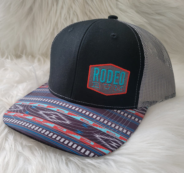Rodeo Bum Embroidered Trucker Snapback Hat with Aztec Print